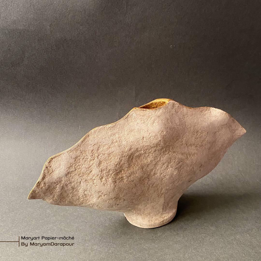 Sand-coloured vessel, studio photo